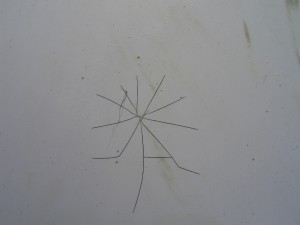 Star crack seen on Mk1 bonnet.